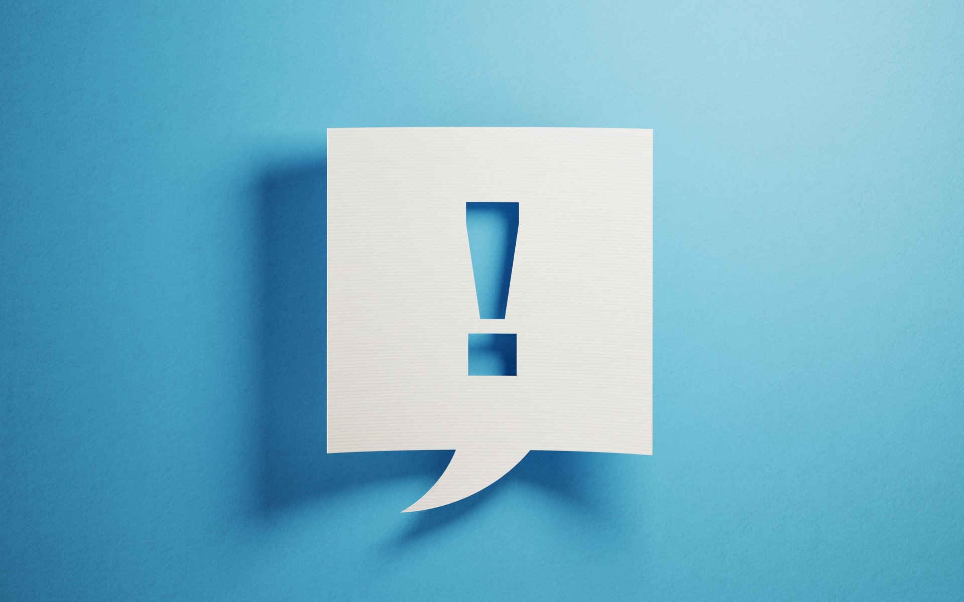 White Chat Bubble On Blue Background
